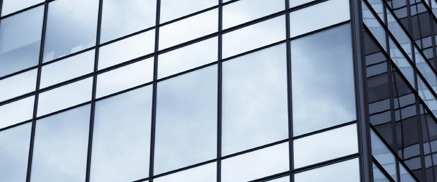 Architectural glass windows on tall building